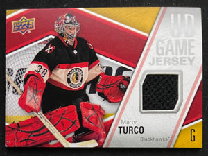 2011-12 Upper Deck - Series Two - UD Game Jersey - Marty Turco - Blackhawks - GJ-MT